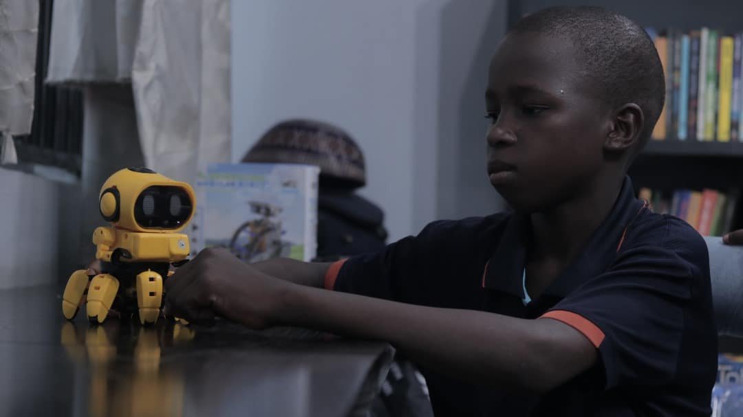 Student Interacting with a Robot